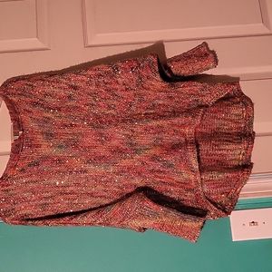 A rainbow sparkly sweater